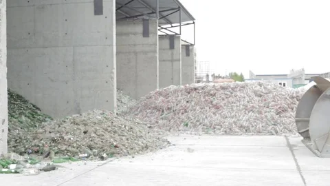 Bulldozer loads garbage Stock Footage 72857815