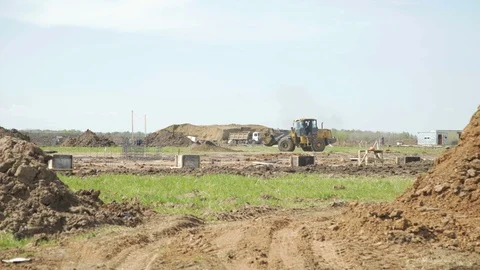 Bulldozer machine moving sand on construction site. Construction equipment Stock-Footage 106449944