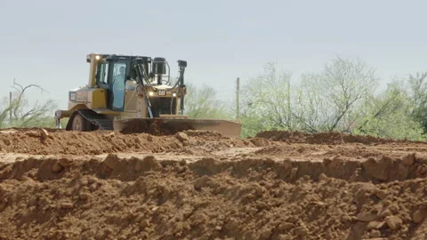 Bulldozer moving earth Stock Footage 217538658