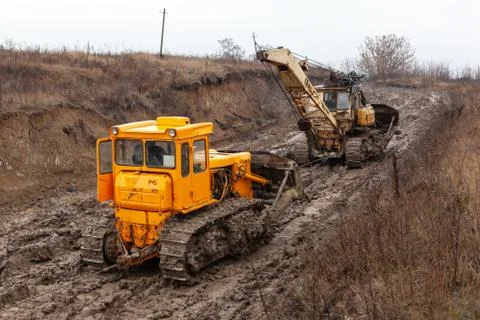 Bulldozer on mud road. Foto stock