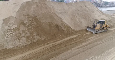 Bulldozer pushing sand on large construction site Stock Footage 96286830