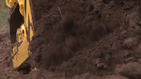 Bulldozer pushing soil close-up Video stock 52778140