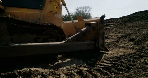 Bulldozer Raking The Ground Hard Work Stock Footage 121365939