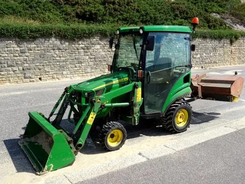 Bulldozer With Rear Sweeper Stock Photos