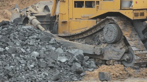 The bulldozer rides backwards. Stock Footage 115012376