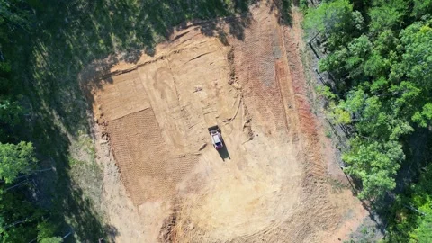Bulldozer Tractor Working on the Field - Drone Footage 스톡 동영상 282995716