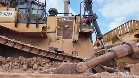 Bulldozer Under Inspection with a Powerful Engine Stock Footage 273333302