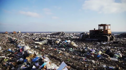 The bulldozer at work at the dump Stock Footage 87423865