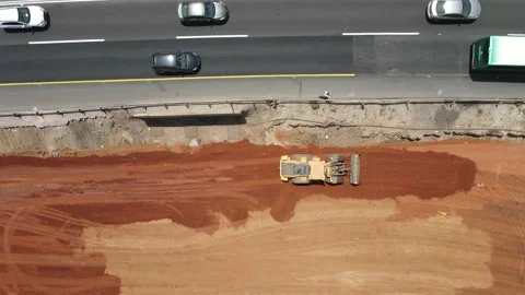 Bulldozer work on new road construction, near exists highway, Aerial view Video stock 139155884