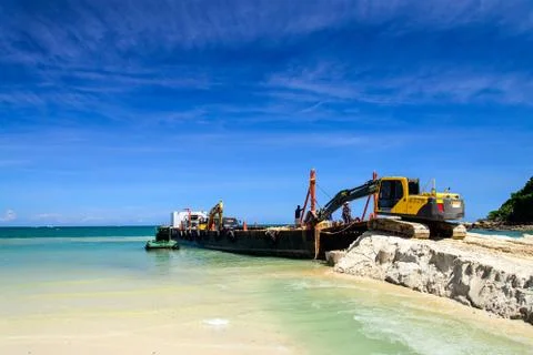Bulldozer working on a beach Stock Photos