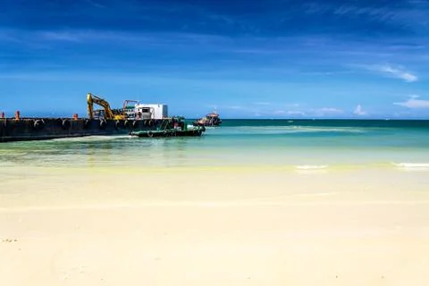 Bulldozer working on a beach Stock Photos