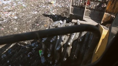 Bulldozer working on landfill Stock Footage 76200302