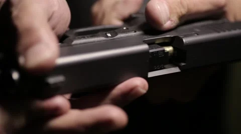 Bullet on the barrel of a gun Stock Footage 61570848