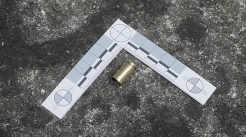 Bullet case and csi ruler Stock Footage 23882552
