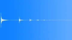 Bullet casing drop on cement echo 01 Sound Effect