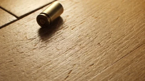 Bullet casing falls on the floor in slow motion, 3 different shots, 9 mm handgun Video stock 148423944