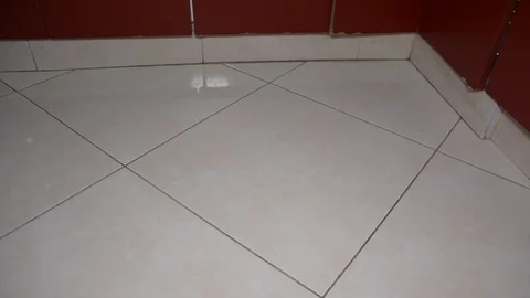 Bullet casings on the ceramic floor. selective focus Видео 100085329