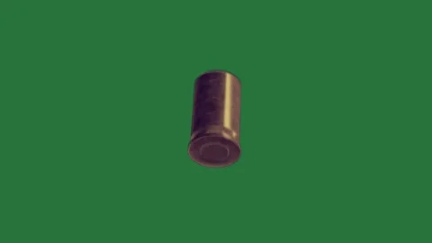 A bullet on green screen and an image of with background brass door handle Stock Footage 335682830