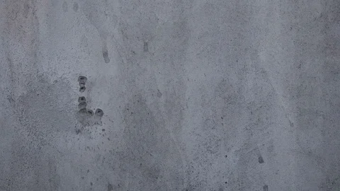 Bullet hits in a concrete wall. Stock Footage 129042458