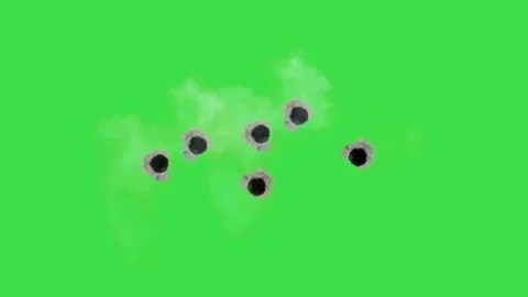 Bullet hole animation with smoke effects on green screen background for vfx work Stock Footage 329964791