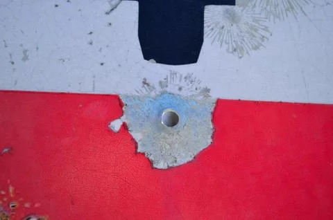 Bullet hole in Old rusty no motor vehicles warning sign Stock Photos
