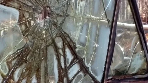 Bullet hole through car window Video stock 72247215