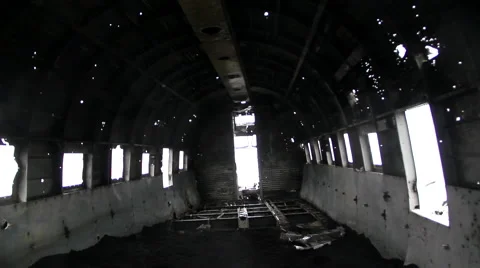 Bullet holes fuselage inside crashed airplane, dolly side camera Vídeo Stock 57513480