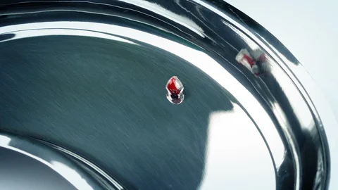 Bullet Placed In Tray By Surgeon Stock Footage 92319257