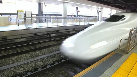 Bullet train arrival to station platform, Tokyo, Japan Stock Footage