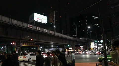 Bullet train crosses over an intersection in Tokyo. 스톡 동영상 25822257
