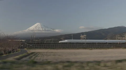 Bullet train at full speed passing in front of Mount Fuji Stock Footage 201611555