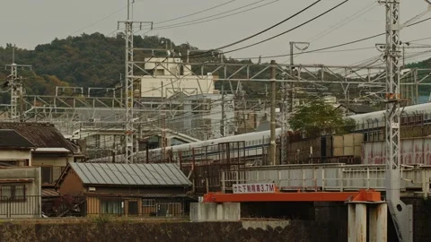 Bullet Train or 'Shinkansen' Leaving Kyoto Station. Stock Footage 221664811