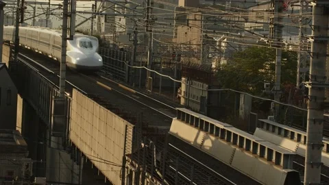 Bullet Train or 'Shinkansen' Leaving Kyoto Station. Stock Footage 221664822