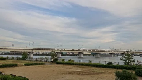 Bullet train passing over a bridge near Osaka, Japan. Stock Footage 164284945