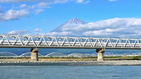 Bullet train passing through mount Fuji Stock Footage 146567963