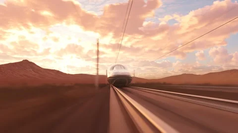 Bullet Train Racing Through the Desert Landscape with Beautiful Pink Cloudy Sky Stock Footage 245830700