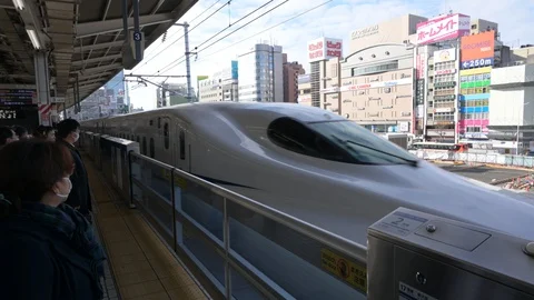 Bullet train Shinkansen arrives at Nagoya Station. Stock Footage 128274053