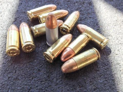 Bullets 9mm 40 caliber close up Stock Photos