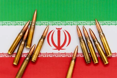 The bullets against the background of Iran's flag are a conceptual represen.. 스톡 사진