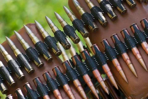 Bullets in ammunition belt Stock Photos