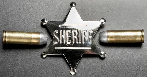 Bullets and Badge. Stock Photos