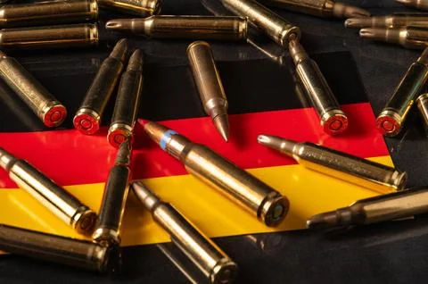 Bullets and German Flag Representing Germany Military Power and Role in Eur.. Stock Photos