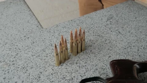 Bullets and magazine for them Stock Footage 194795687