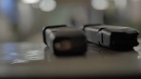 Bullets are on the table close up Stock Footage 126373025