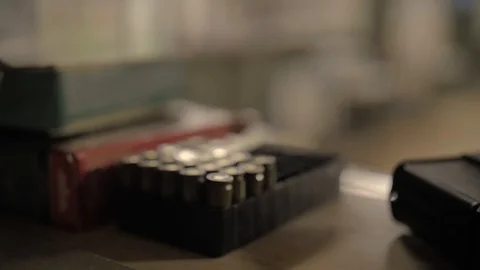 Bullets are on the table close up Stock Footage 126373058
