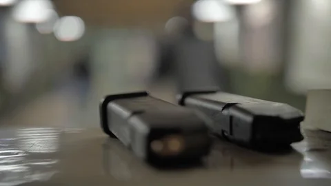 Bullets are on the table close up Stock Footage 126373121