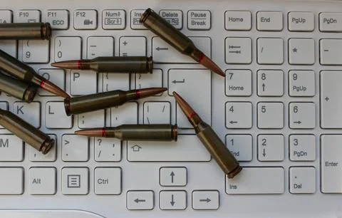 Bullets Around The Enter Key on a White Computer Keyboard 스톡 사진