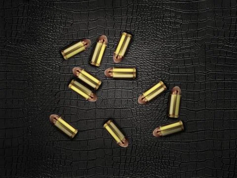 Bullets on a black leather background Stock Photos