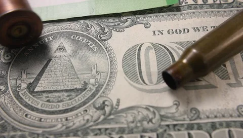 Bullets cartridges on the dollar bill, the concept of selling weapons Vídeo Stock 100741961