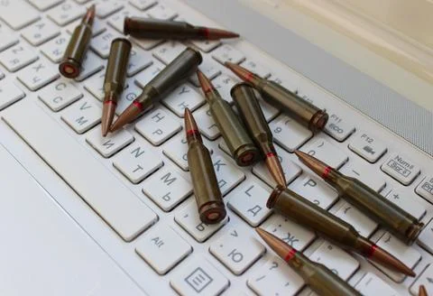 Bullets on a Computer Keypad Angle View Stock Image 스톡 사진
